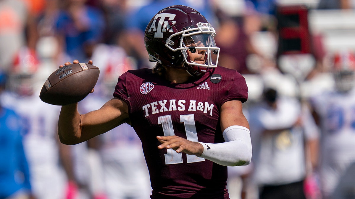 Texas A&amp;M quarterback Kellen Mond (11) passes downfield against Florida during the second half of an NCAA college football game, Saturday, Oct. 10, 2020. in College Station, Texas. A rare, four-year starting quarterback in the SEC, Mond has become the program’s all-time passing leader while guiding the seventh-ranked Aggies to a 3-1 start. (AP Photo/Sam Craft)