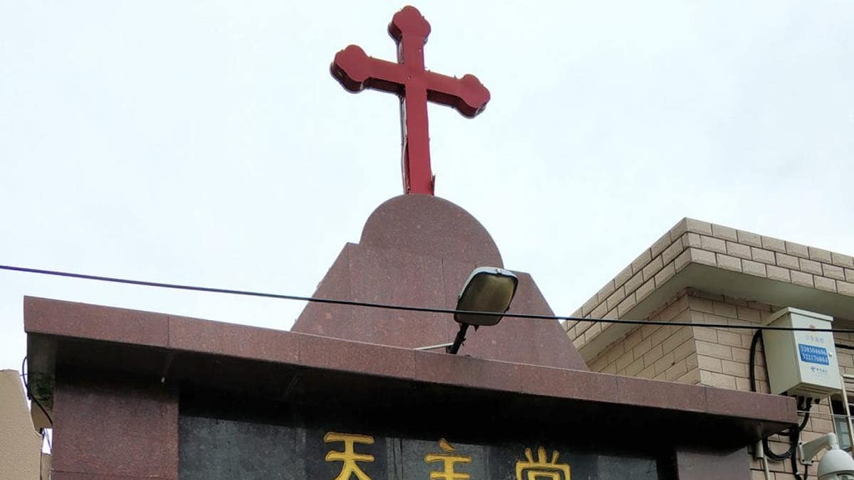 Cross on top of church building in China