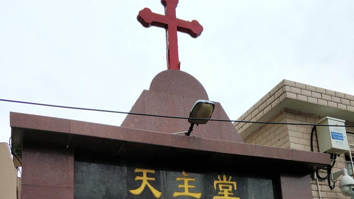 Cross on top of church building in China