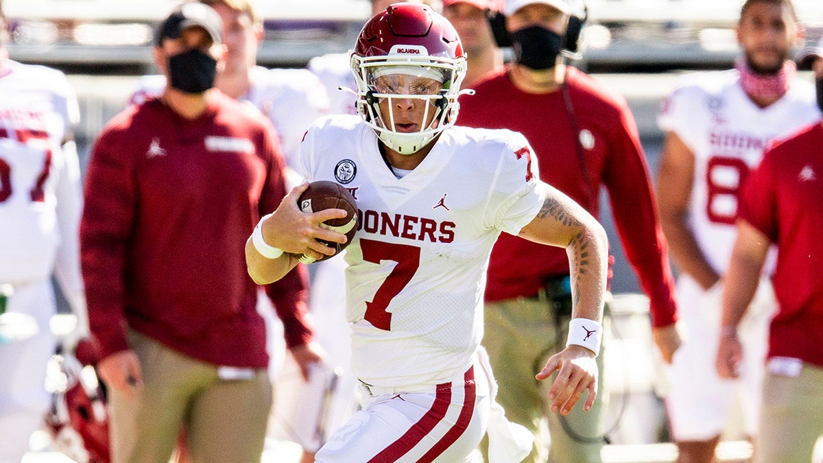 Spencer Rattler scrambling with the ball