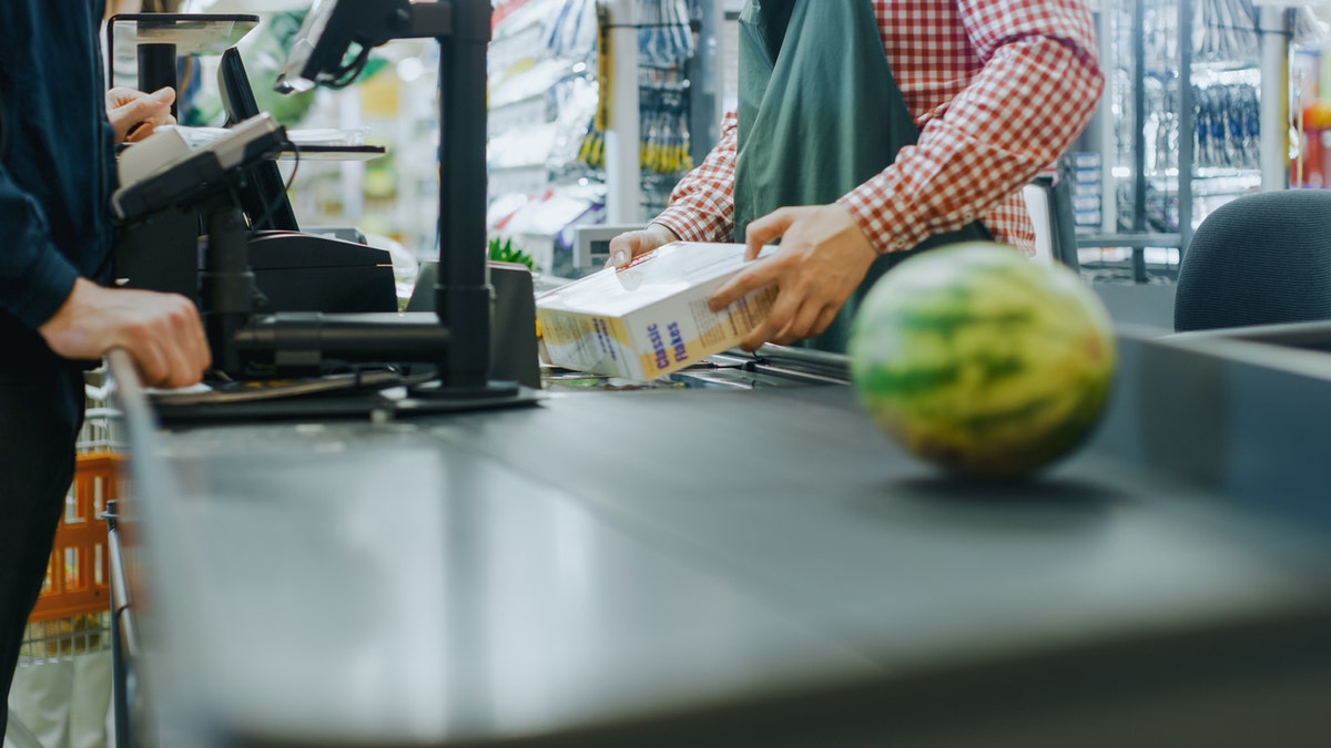 Workers who directly interacted with customers were five times more likely to test positive, per the study. (iStock)