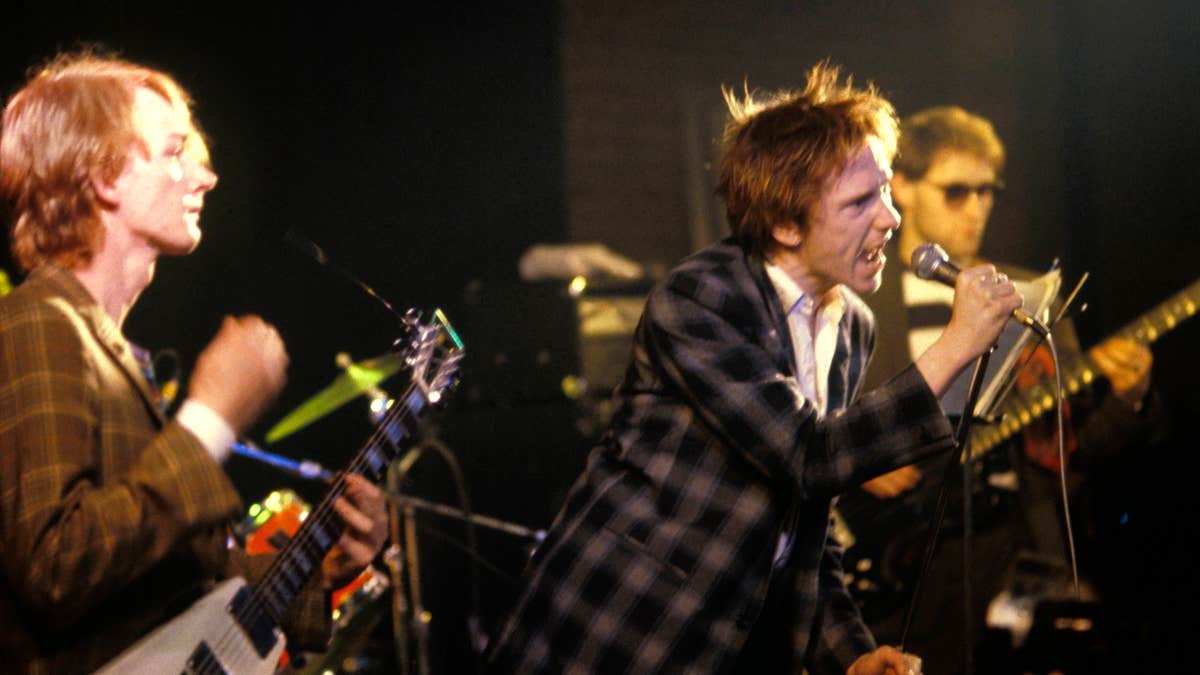 John Lydon performs with an early iteration of PiL (the band has had over 40 members through the years). (Virginia Turbett/Redferns)