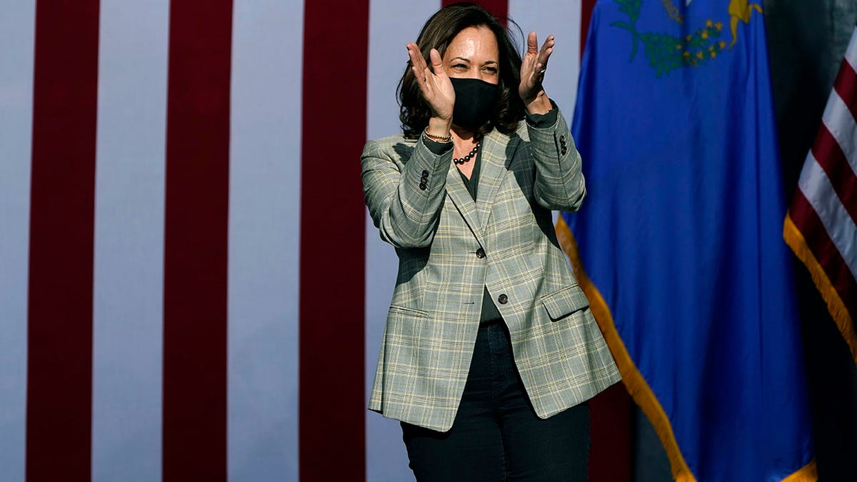 Democratic vice presidential candidate Sen. Kamala Harris, D-Calif., reacts after speaking at a drive-in campaign event Friday, Oct. 2, in Las Vegas. (AP Photo/John Locher)