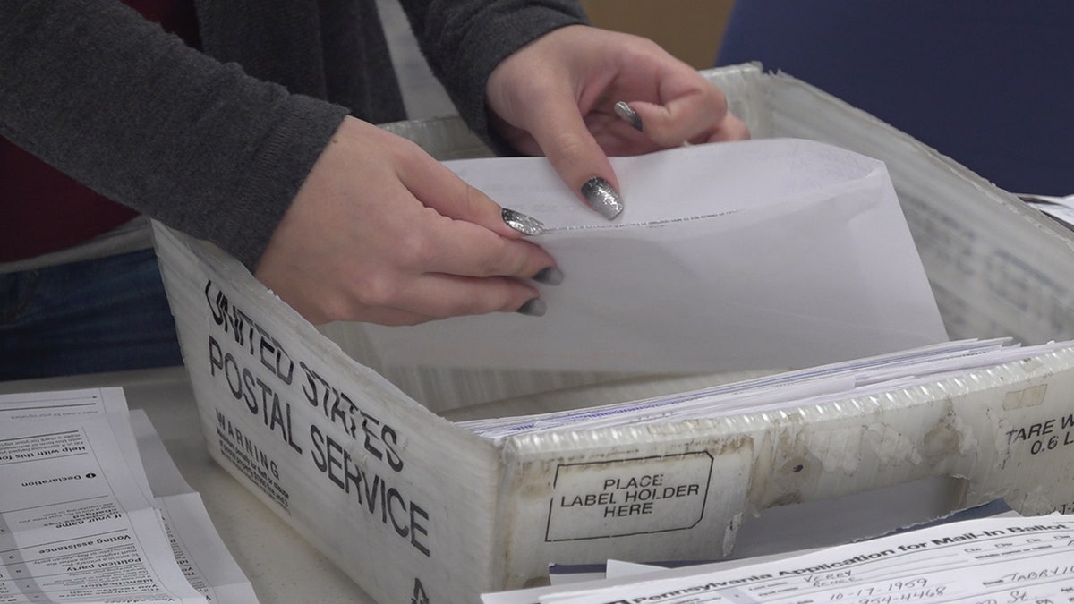Election workers in Luzerne County - a swing county- are dealing with more mail-in ballots than ever.
