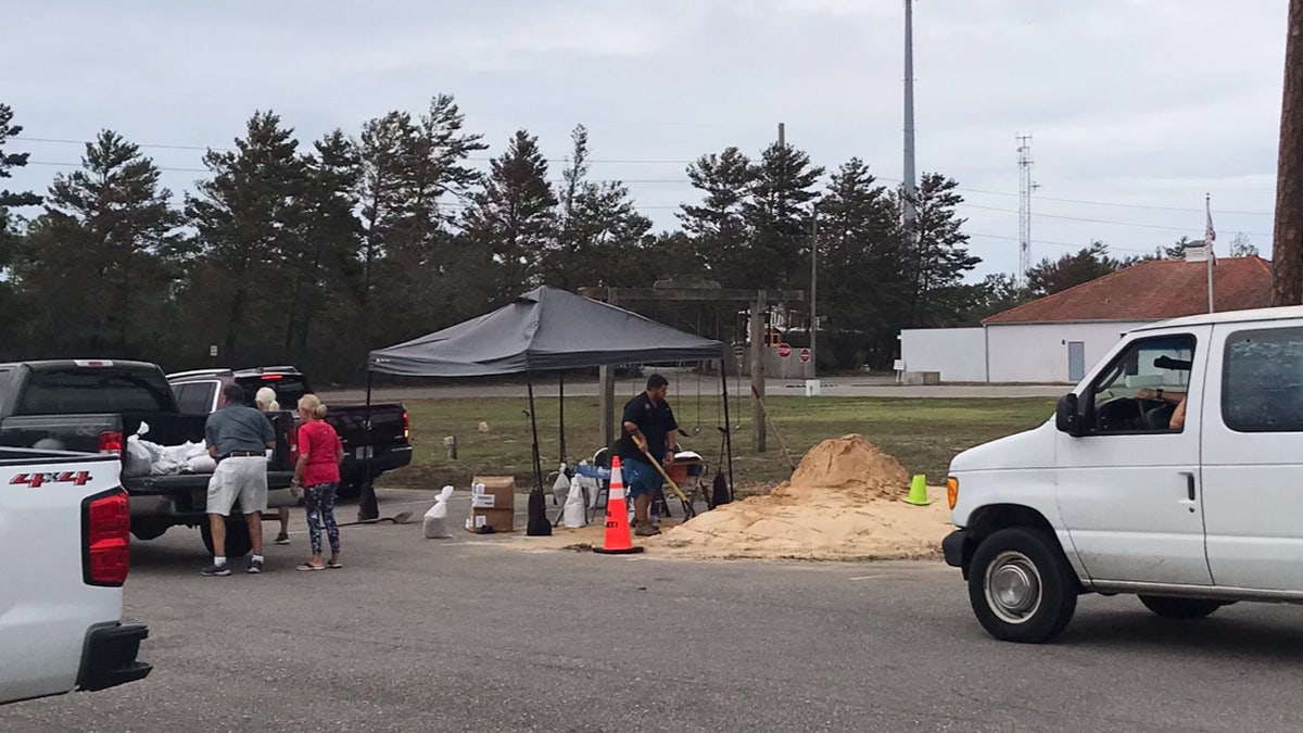Officials in Orange Beach, Ala. were handing out sand and sand bags in preparation for Hurricane Delta.