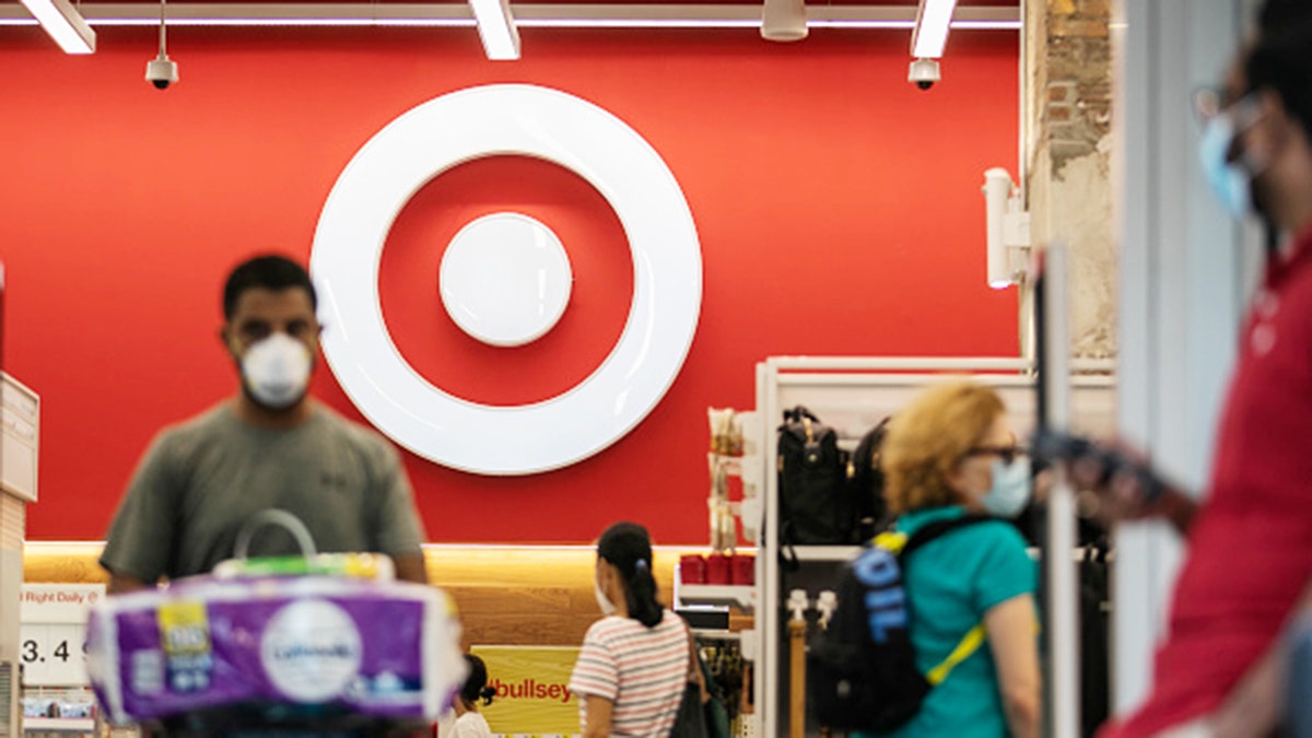 Shoppers wear protective masks inside a Target store in New York on Aug. 15, 2020. (Jeenah Moon/Bloomberg via Getty Images)