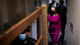 Supreme Court nominee Amy Coney Barrett arrives for her Senate Judiciary Committee confirmation hearing before the Senate Judiciary Committee on Capitol Hill in Washington, Monday, Oct. 12, 2020. (Caroline Brehman/Pool via AP)