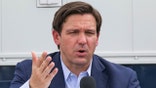 Florida Governor Ron DeSantis speaks during a news conference at the Miami Beach Convention Center on the Army Corps' building of a coronavirus field hospital inside the facility, amid the coronavirus disease (COVID-19) outbreak, in Miami Beach, Florida, U.S. April 8, 2020. Al Diaz/Pool via REUTERS - RC2K0G9RG4Y2