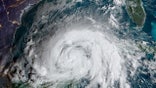 Zeta, now a tropical storm, moves over Mexico's Yucatan Peninsula on Tuesday, Oct. 27, 2020.