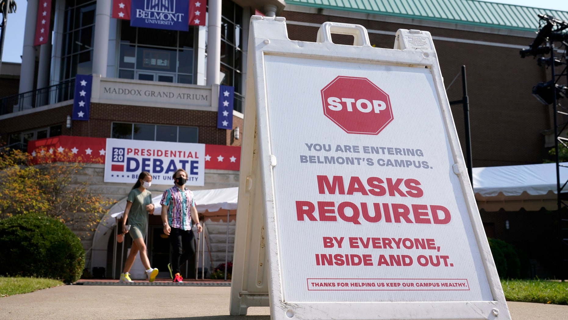 A sign greets visitors outside the Curb Event Center at Belmont University as preparations take place for the second Presidential debate, Tuesday, Oct. 20, 2020, in Nashville, Tenn., during the coronavirus outbreak. (AP Photo/Patrick Semansky)