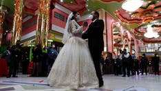 Wedding guests want to know your mask policy before they RSVP