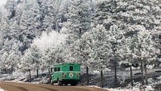 Colorado wildfires hit with snow in 'welcome sight' for firefighters