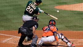 Pinder's HR helps rally A's past Astros 9-7, trail ALDS 2-1