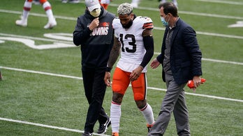 Browns' Beckham, Washington's Collins leave with injuries