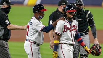 Acuña HR, plunked again, Braves top Marlins 9-5 to open NLDS