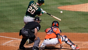 Pinder's HR helps rally A's past Astros 9-7, trail ALDS 2-1
