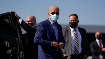 Leading Trump in polls, Biden tries to run down the clock