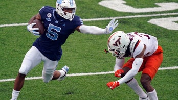 Carter, No. 8 UNC run past No. 19 Virginia Tech 56-45