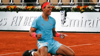 Nadal beats Djokovic in straight sets at French open to win 20th Grand Slam
