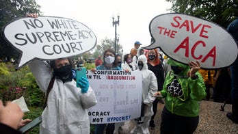 Protesters at Amy Coney Barrett confirmation hearing arrested for blocking Senate building entrance