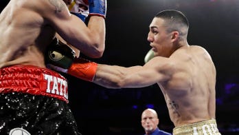 Teofimo Lopez upsets Vasiliy Lomachenko to unify lightweight titles