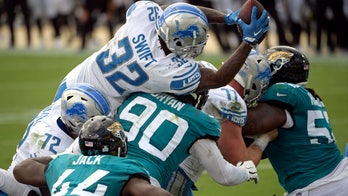 Stafford, Swift, Lions protect big lead, pound Jaguars 34-16
