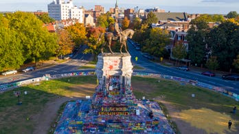 Trump supporters, protesters clash at Robert E. Lee monument in Virginia