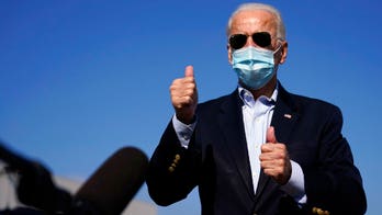 Biden takes rare questions from reporters at campaign stop