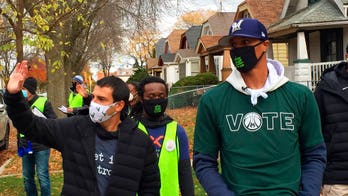 Wisconsin governor urges voters to come to polls rather than mail ballots