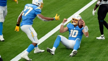 Herbert leads Chargers to 39-29 victory over Jaguars