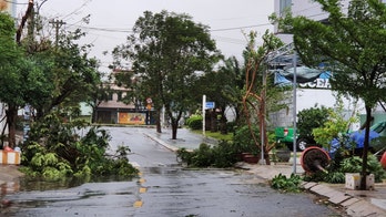 Strong typhoon slams Vietnam; at least 2 dead, 26 missing