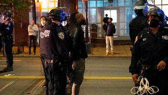 New York City police arrest 32 during overnight unrest after fatal police shooting in Philadelphia