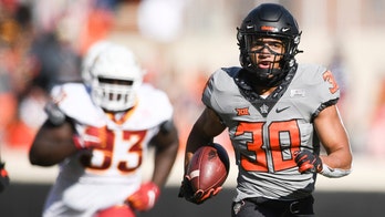 Sanders, Hubbard lead No. 6 Oklahoma St. past Iowa St. 24-21