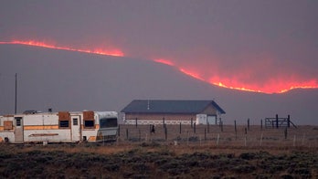 Colorado wildfire forces new evacuations as firefighters 'praying we get a lot of snow'