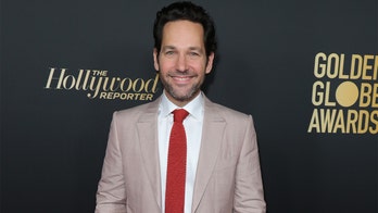 Paul Rudd hands out cookies to New Yorkers waiting in the rain to vote