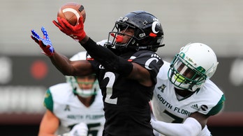 No. 15 Cincinnati rolls past South Florida, 28-7