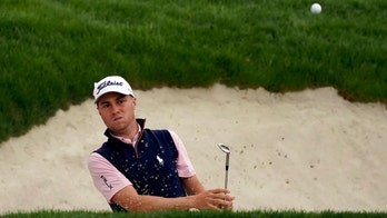 Late birdies let Justin Thomas keep slim lead at Sherwood