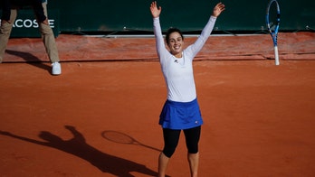Years after anorexia, hiatus, Italian reaches French Open QF