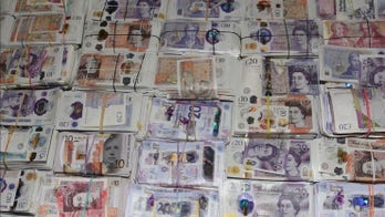 Authorities at Heathrow Airport seize $2.48M from luggage of woman involved in alleged money laundering scheme