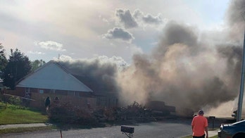 Navy plane crashes into Alabama neighborhood, killing both crewmen