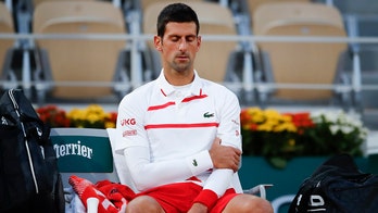 Djokovic's body acts up at French Open; faces Tsitsipas next