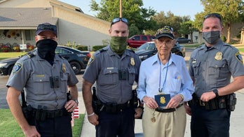 Oklahoma police officers help veteran celebrate 100th birthday