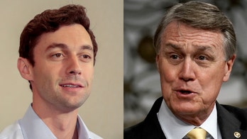 With Alaska call, all eyes on Georgia's two unresolved Senate races