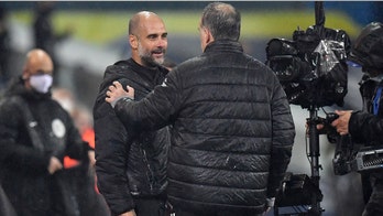 Man City slips further behind leader Everton with Leeds draw