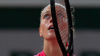 Emotions flood back for Kvitova as she reaches quarterfinals