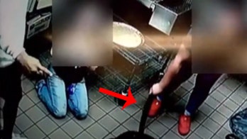 Pizza Hut employee filmed chasing robbery suspects away while brandishing pizza cutter