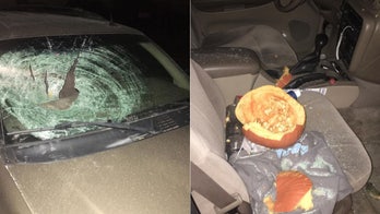 Pumpkin tossed off Indiana overpass smashes car windshield, narrowly misses college student