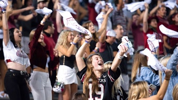 Hundreds break social distancing after South Carolina game