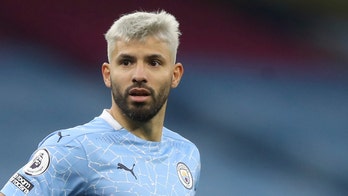 Manchester City's Sergio Aguero scrutinized for grabbing female referee during match