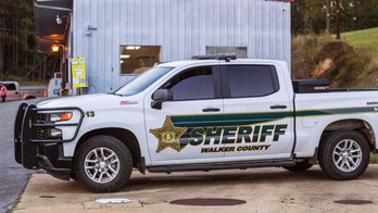 Alabama woman mauled to death by pack of dogs while walking on road